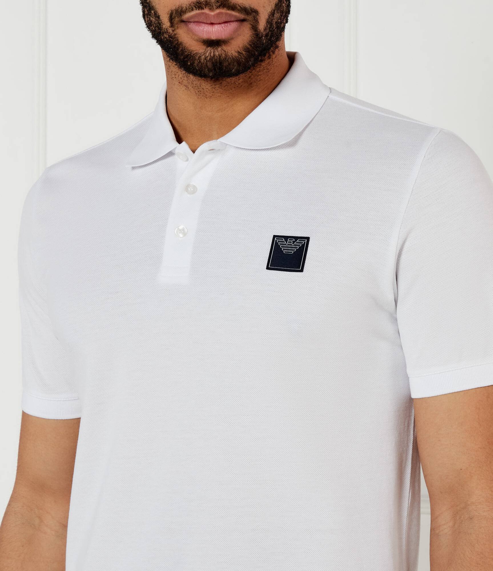 Polos manches courtes  Emporio armani EM000571 AF12336 U0002 WHITE